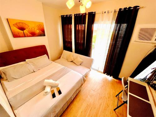 Cozy Studio with Balcony in Mesaverte near SM Downtown 4pax max with Free Pool & Netflix