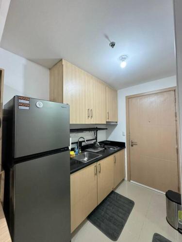 Cozy condo by the MRT & Light Mall experience comfort and convenience