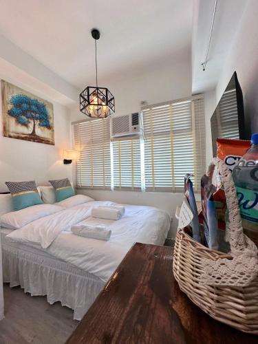 Studio One Condominium, Alabang - Bluu - Fiber Wi-Fi, Netflix-ready