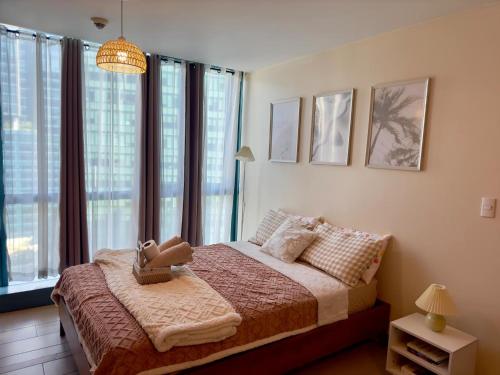 Cozy 1BR Condo with Uptown Mall View - BGC Zen Suite