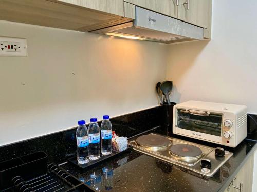 Casa Eleganza at Fame Residences - 1BR corner unit, CBD, Gym, Pool, WiFi, Great View