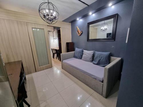 Industrial Design Bachelor's Pad with Pool View in Shore Residences