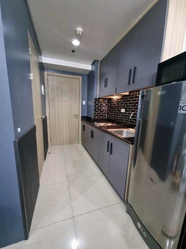 Industrial Design Bachelor's Pad with Pool View in Shore Residences