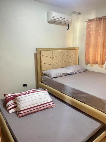 Budget Family 2BR Fast Wifi Free Pool beside SM Mall