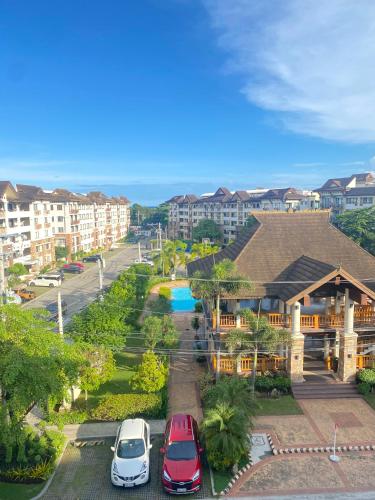 Budget Family 2BR Fast Wifi Free Pool beside SM Mall