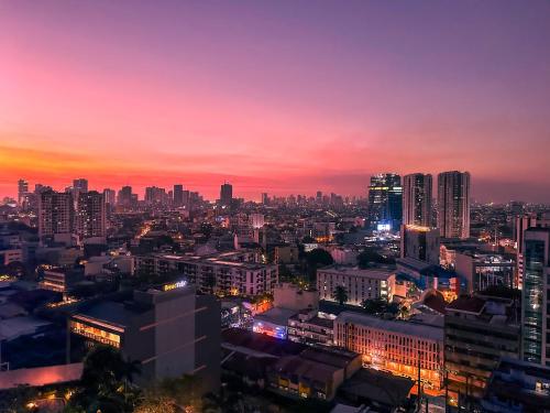 Air residences makati with balcony city lights view