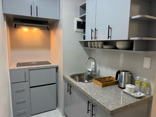 Twin Hearts Residences - RMB Suite Room 217