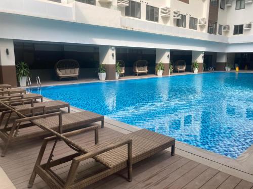 BE Residences Luxury Studio Apartments, AC, Pool, Gym, near IT Park