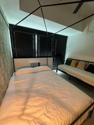 1br wNetflix Disneyplus and pool across SM Megamall Ortigas CBD