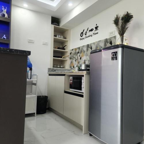 Condo Azur Suites B316 near Airport, Netflix, Stylish, Cozy with swimming pool