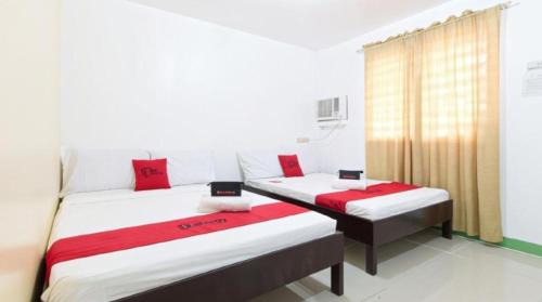 Galoso Travellers Inn by RedDoorz