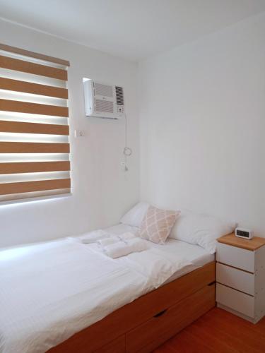 Bali inspired 2 bedroom in Lipa netflix pool and parking