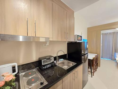 1BR Condotel with Balcony at FAME Residences #FM61