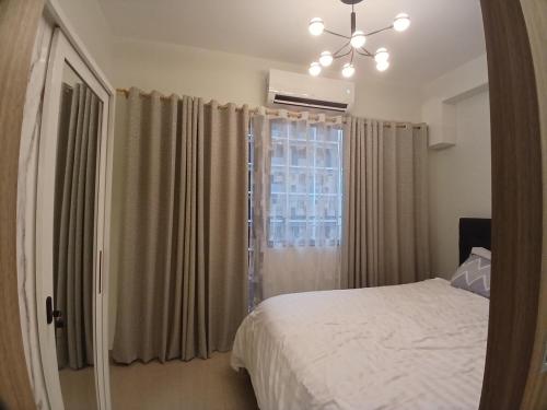 Shore2 Haven - Chic Condotel Near Mall of Asia