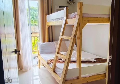 Family 2BR Apartment with Private Gym & Pool - B2 1Nambulite