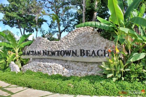 Mactan Newtown condo free pool with private beach access