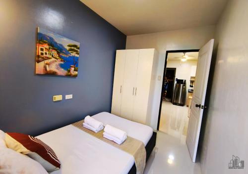 Palawan Luxury 2BR Condo with Pool, Gym & Parking - B1 5Kunzite