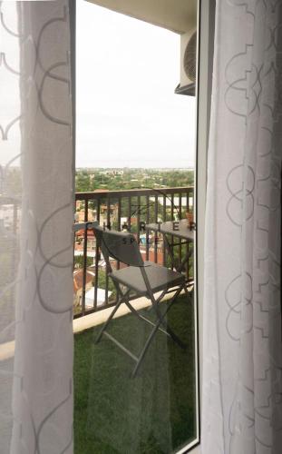 Close to Airport Room with Balcony and Pool Access