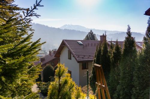 Willa i Wzgórze Jerrego Apartamenty i pokoje z widokiem na góry