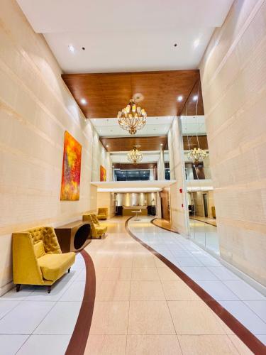 New Condo at Grand Riviera Suites across US Embassy