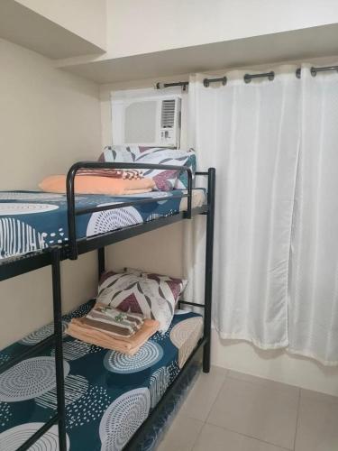2 bedroom Avida Tower Riala VillaHermia Staycation