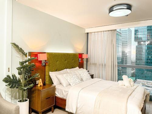 BGC 1BR Condo Steps from Grand Hyatt #ournw18l