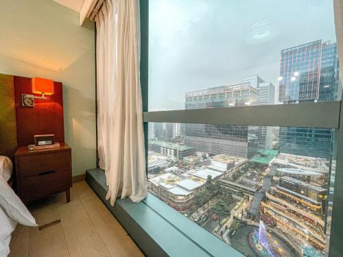 BGC 1BR Condo Steps from Grand Hyatt #ournw18l