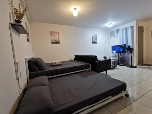 Luna staycation Cozy Condo near Enchanted Kingdom