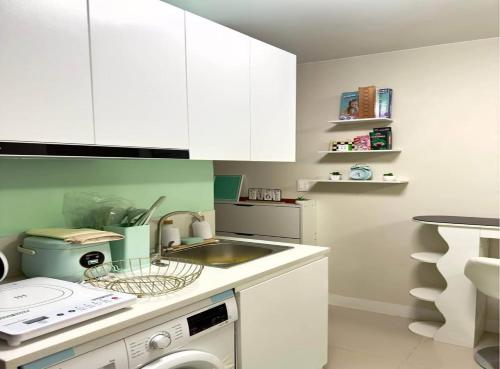 Cozy Studio with Balcony and Pool View