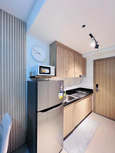 Staycation near SM MOA by Shara Dungo