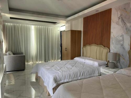 Benny's Hotel-Inspired & Condo-Inspired Rooms and Pool