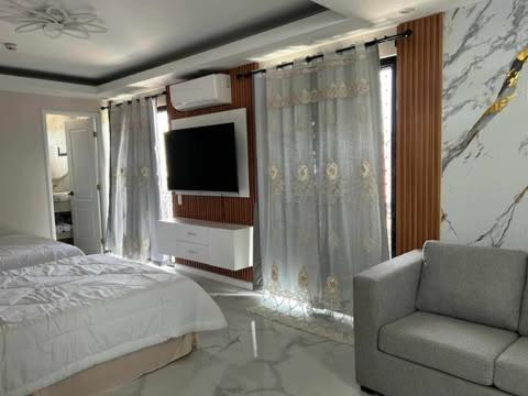 Benny's Hotel-Inspired & Condo-Inspired Rooms and Pool