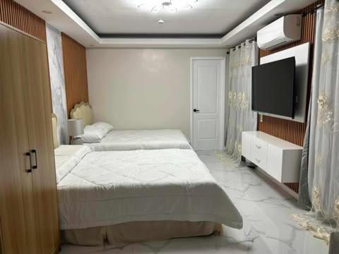 Benny's Hotel-Inspired & Condo-Inspired Rooms and Pool