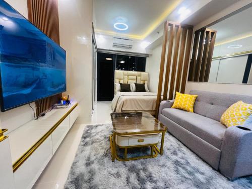 Modern Makati Condo with Balcony & Cityscape Views