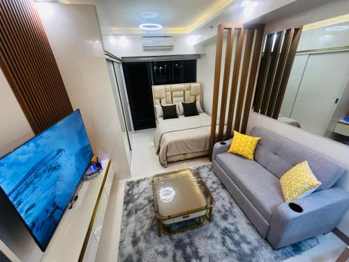 Modern Makati Condo with Balcony & Cityscape Views