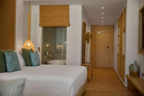 The Club Cala San Miguel Hotel Ibiza, Curio Collection by Hilton