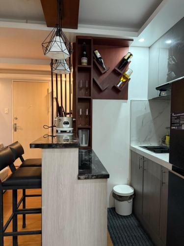 Cozy CondoVibe 2 BR Staycation near SM East Ortigas with Netflix