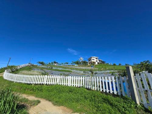 Inn the Mountain a farm house on a foggy farm hill