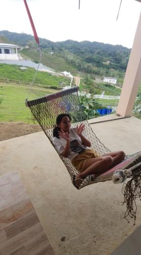 Inn the Mountain a farm house on a foggy farm hill