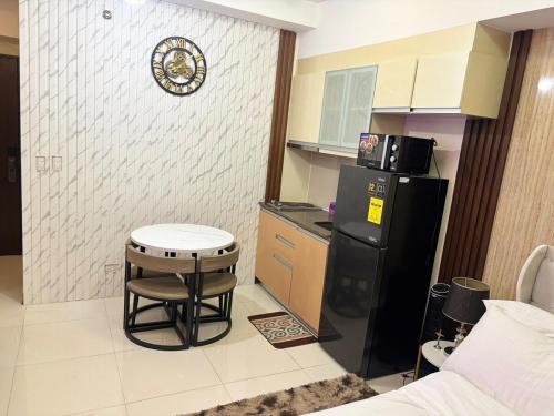 Cozy Studio near BGC Super Fast Wi-Fi