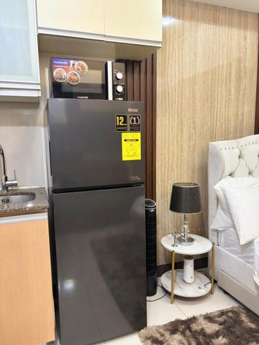 Cozy Studio near BGC Super Fast Wi-Fi