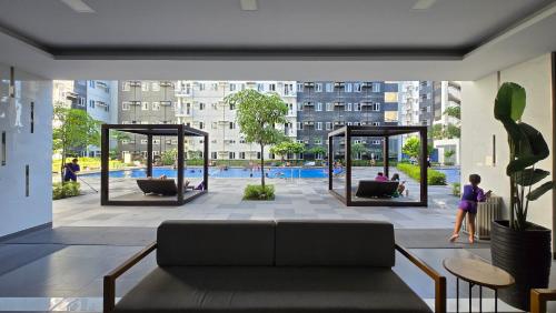 Urban Oasis 2BR Condo with Multiple Pools at SMDC Charm Residences