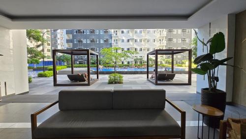 Urban Oasis 2BR Condo with Multiple Pools at SMDC Charm Residences