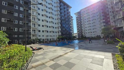 Urban Oasis 2BR Condo with Multiple Pools at SMDC Charm Residences