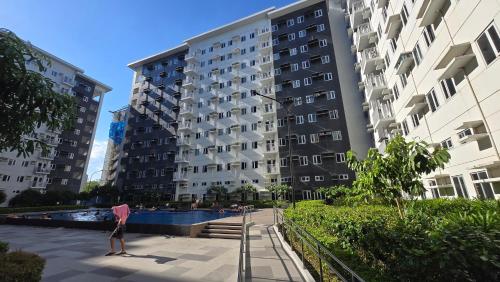 Urban Oasis 2BR Condo with Multiple Pools at SMDC Charm Residences
