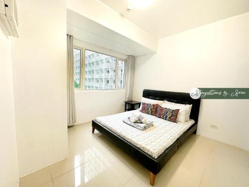 Shore Residences 2 Bedroom with Balcony Near NAIA Airport MOA