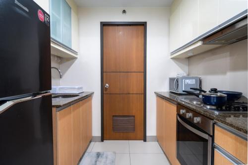 One Uptown Residence BGC 2BR Cor unit with balcony , washer