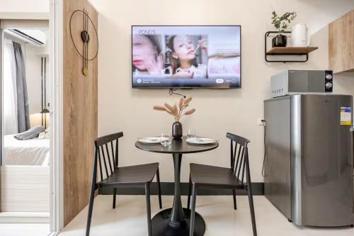 Modern Minimalist Studio with Balcony & Sunset View