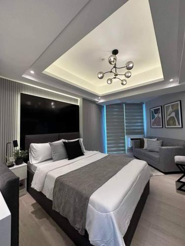 Stylish Stay at Azure North near Malls and Tourist Destinations