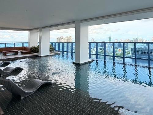 38 Park Ave Studio in IT Park with Netflix, Pool & Gym